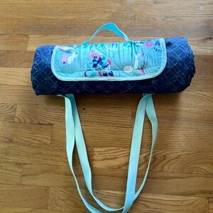 Cupcakes & Cashmere  Quilted roll-up picnic blanket tote with handle and straps
